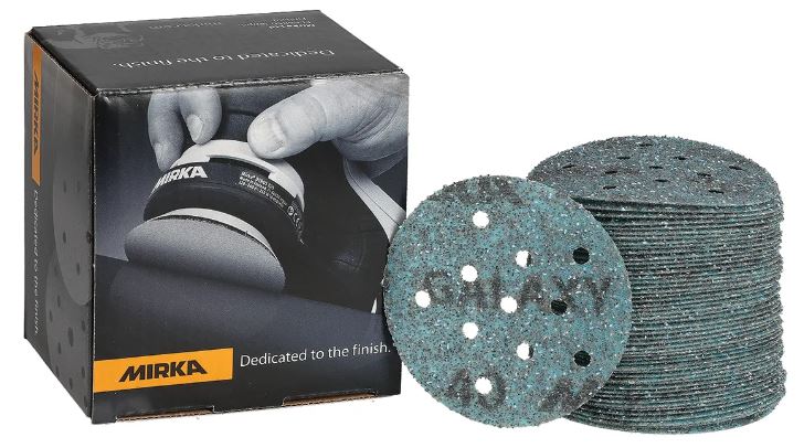 Abbildung Mirka Galaxy 77mm Multifit Verpackung und Scheiben als Stapel.