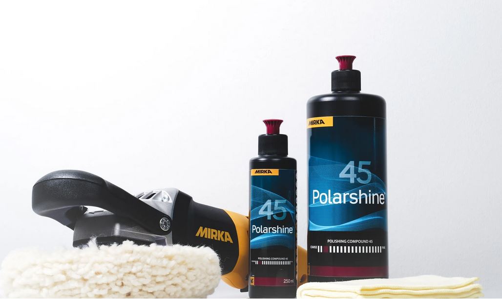 Abbildung Mirka Polarshine 45 Politur 1L und 250ml Flasche mit Poliermaschine und Mikrofasertuch.